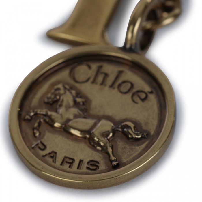 GOLDEN BROWN BRASS LOGO KEY... 2