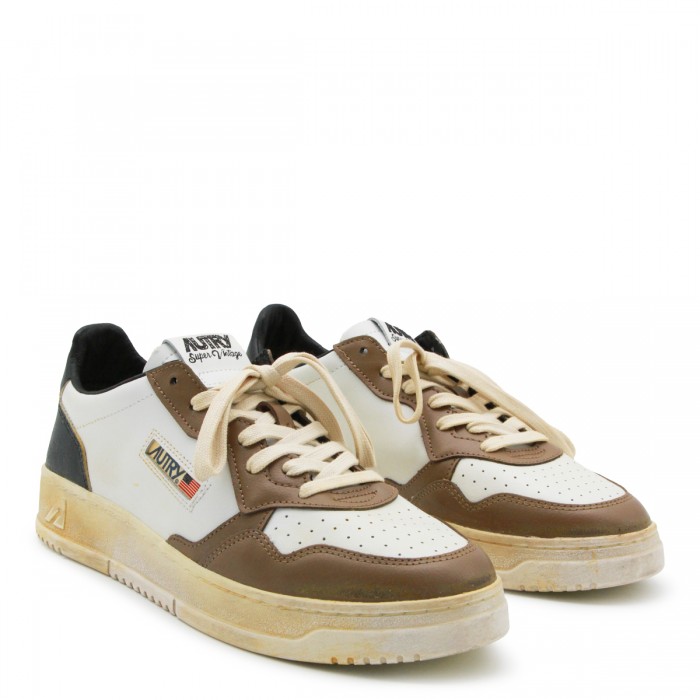 WHITE AND MALTMAL LEATHER... 2